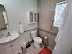 Full bathroom with handicap accessible shower